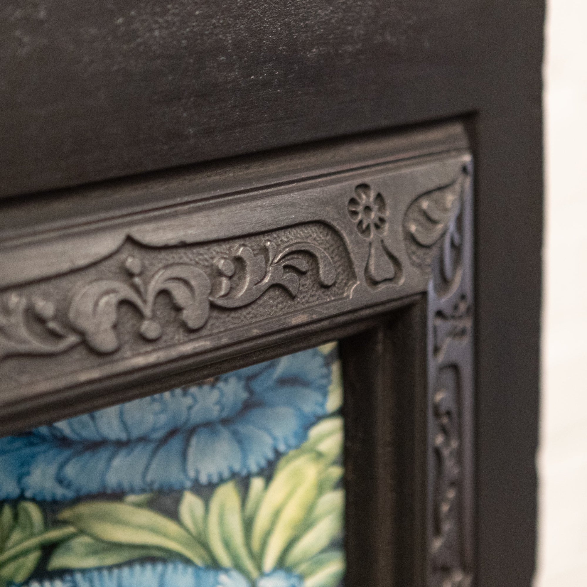 Antique Cast Iron Insert with Blue Floral Tiles | The Architectural Forum