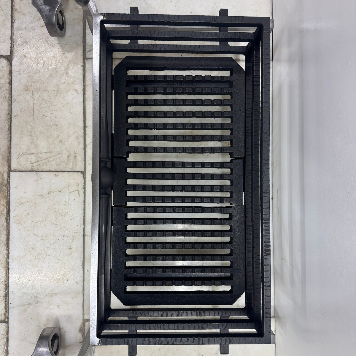 Reclaimed Polished Steel Byron Fire Basket with Newton Scroll Andirons | The Architectural Forum
