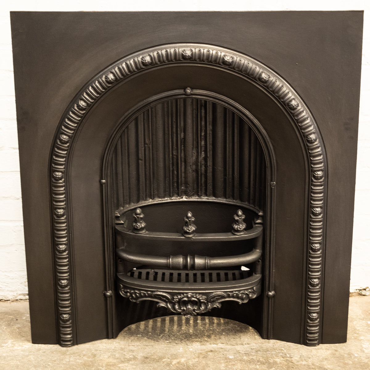 Antique Cast Iron Arched Fireplace Insert With Finials | The Architectural Forum