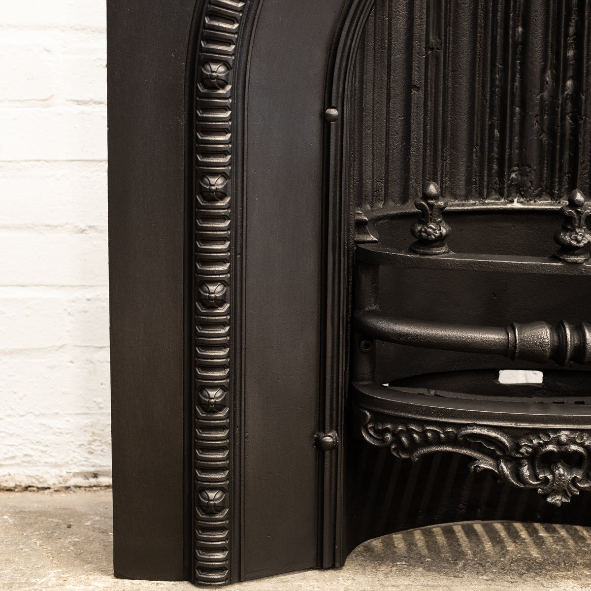 Antique Cast Iron Arched Fireplace Insert With Finials | The Architectural Forum