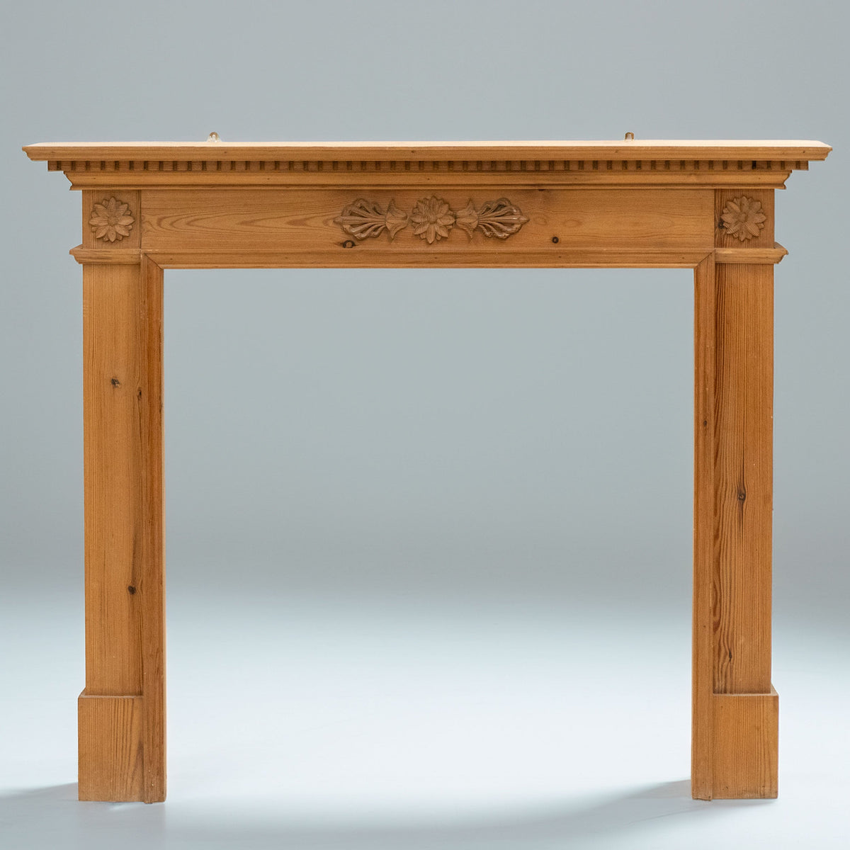 Antique Wooden Fireplace Surround with Flowers | The Architectural Forum