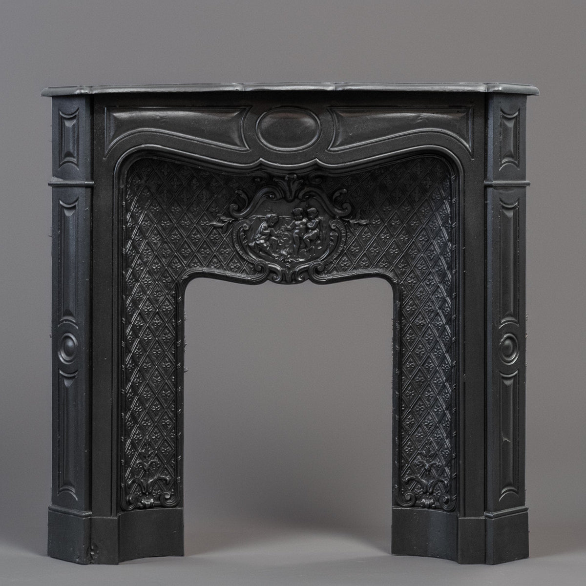 Rare Highly Ornate Antique Cast Iron Fireplace Surround | Pair Available | The Architectural Forum