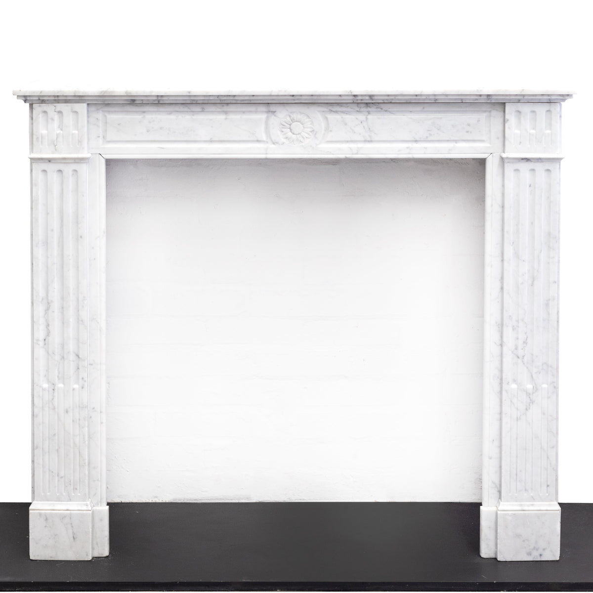 Reclaimed Louis XVI Style Carved Marble Fireplace in Carrara Marble | The Architectural Forum