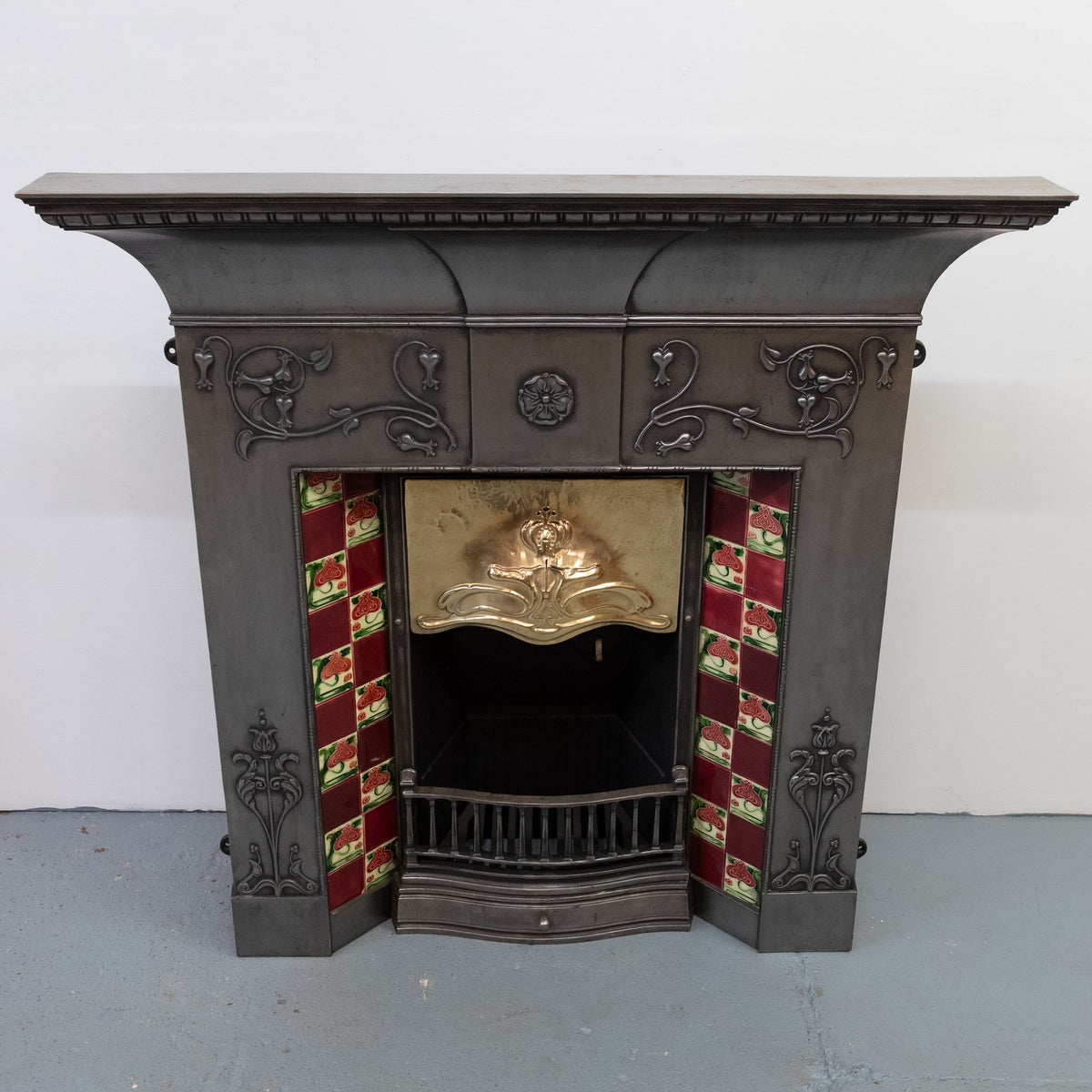Antique Polished Cast Iron Art Nouveau Combination Fireplace With Tiles and Brass Hood | The Architectural Forum