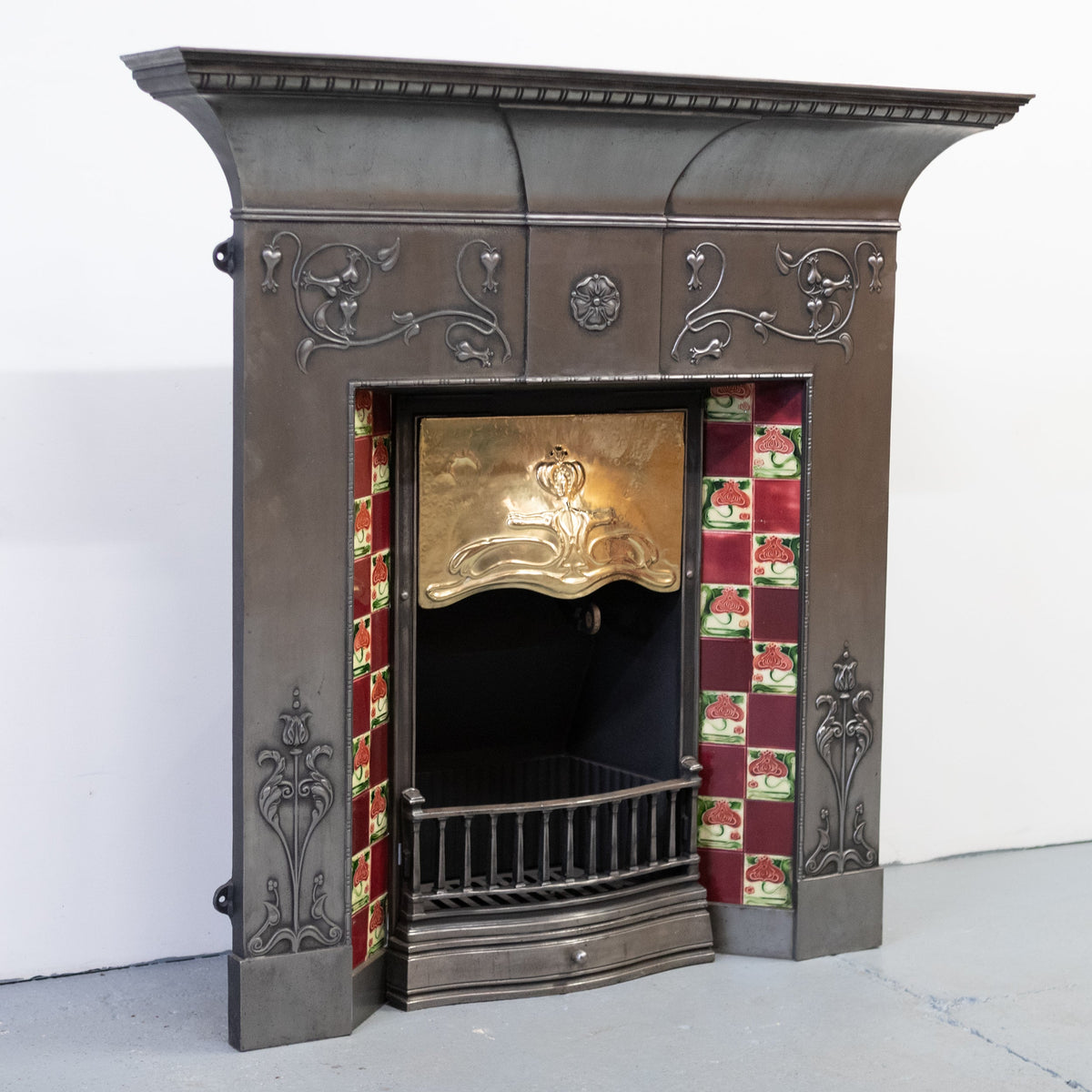 Antique Polished Cast Iron Art Nouveau Combination Fireplace With Tiles and Brass Hood | The Architectural Forum