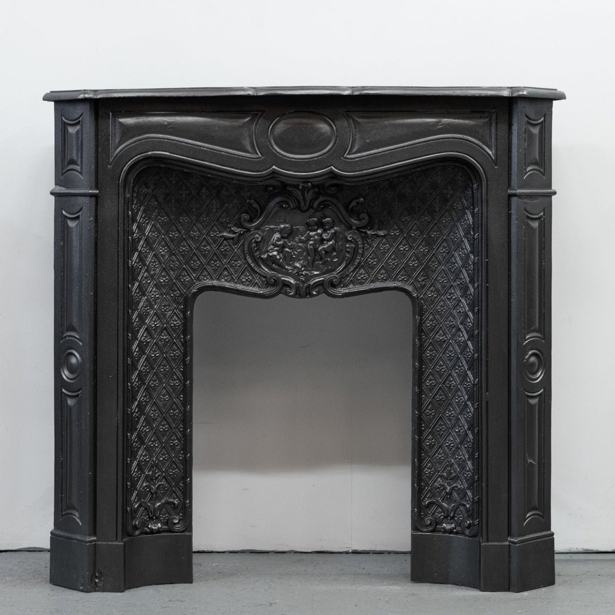 Rare Highly Ornate Antique Cast Iron Fireplace Surround | Pair Available | The Architectural Forum