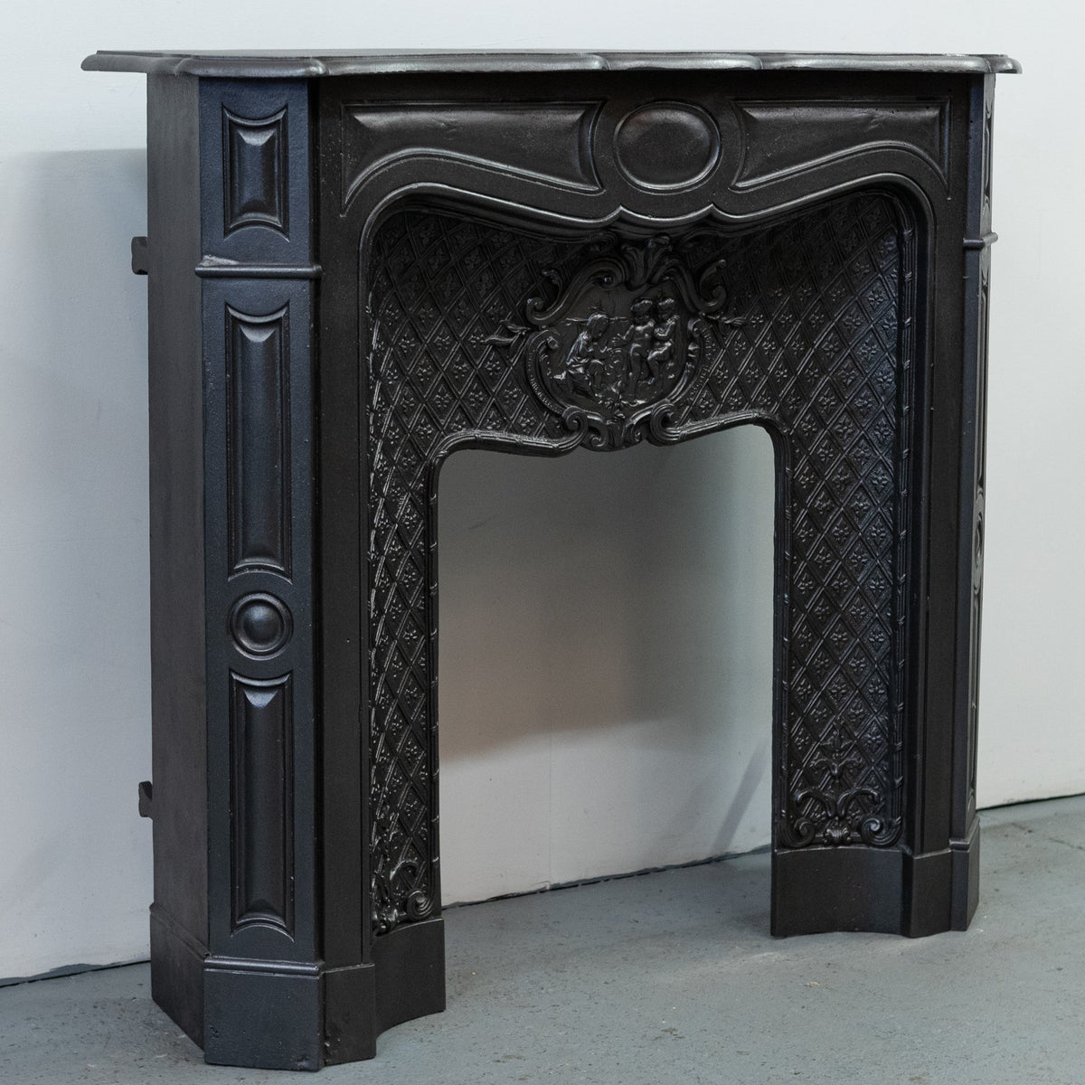 Rare Highly Ornate Antique Cast Iron Fireplace Surround | Pair Available | The Architectural Forum