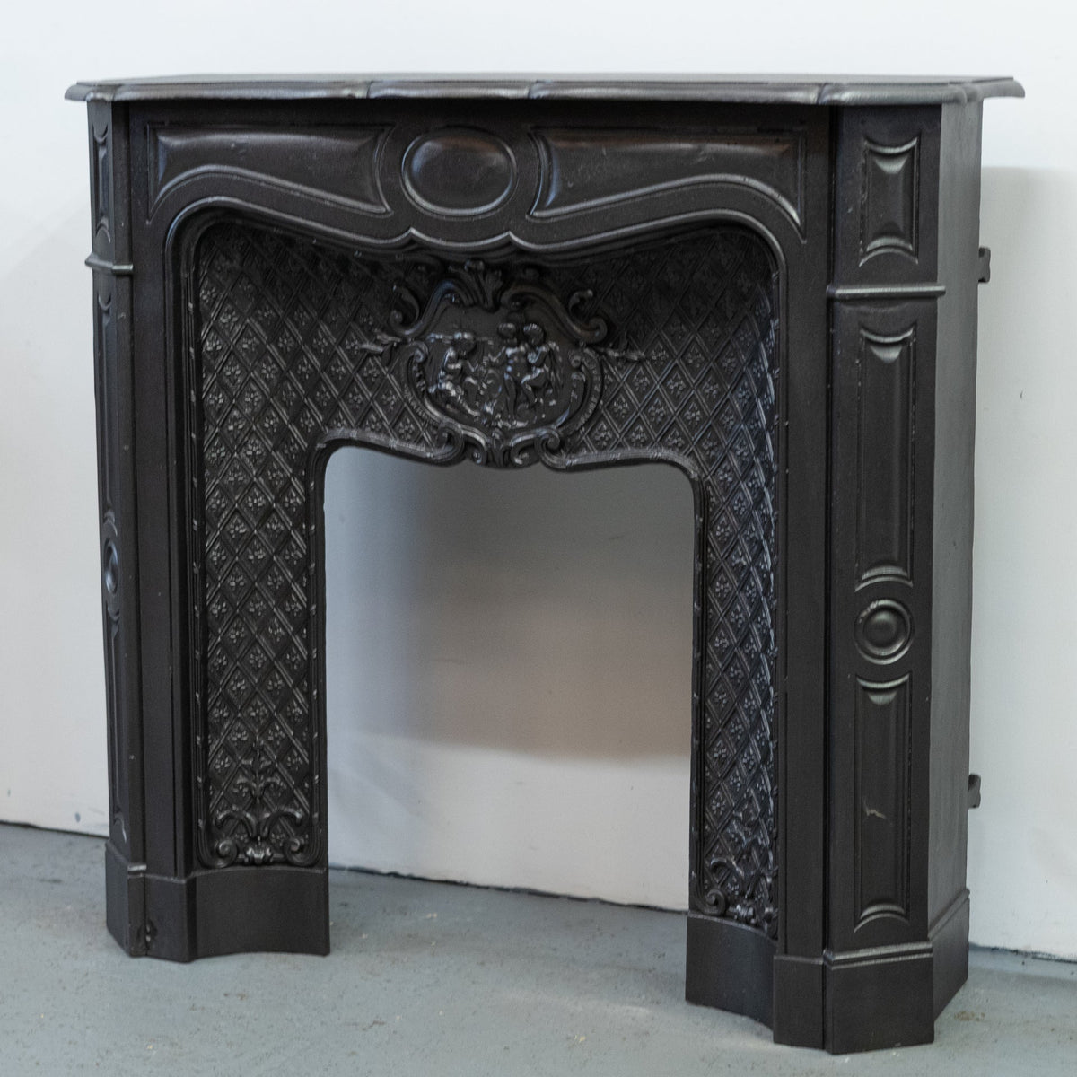 Rare Highly Ornate Antique Cast Iron Fireplace Surround | Pair Available | The Architectural Forum