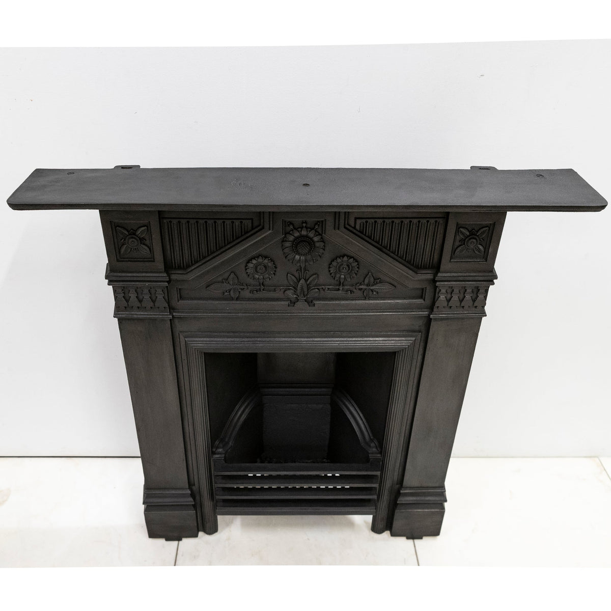 Antique Cast Iron "The Daisy" Combination Fireplace | The Architectural Forum
