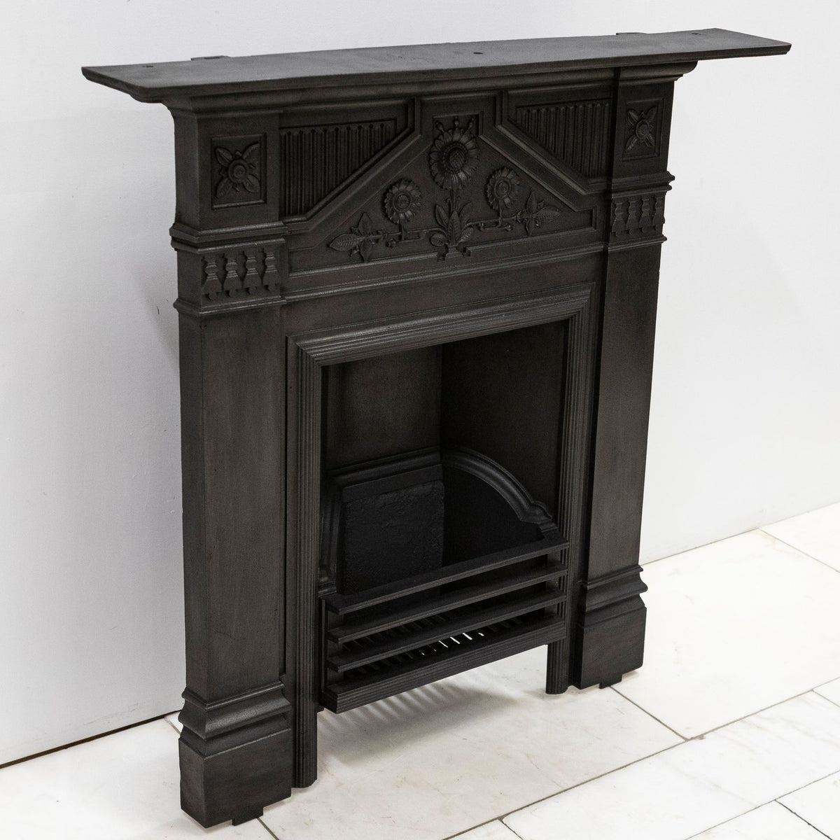 Antique Cast Iron "The Daisy" Combination Fireplace | The Architectural Forum