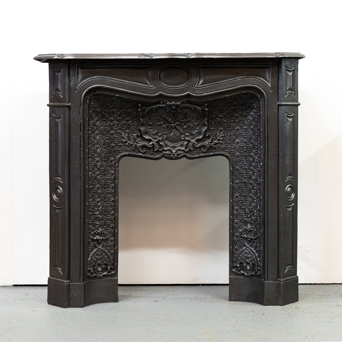 Rare Highly Ornate Antique Cast Iron Fireplace Surround | Pair Available | The Architectural Forum