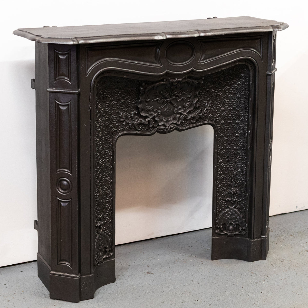 Rare Highly Ornate Antique Cast Iron Fireplace Surround | Pair Available