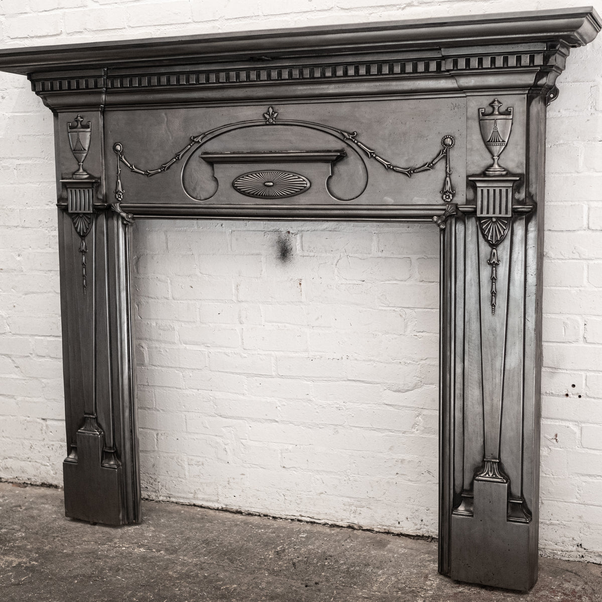 Antique Polished Cast Iron Fireplace Surround | The Architectural Forum