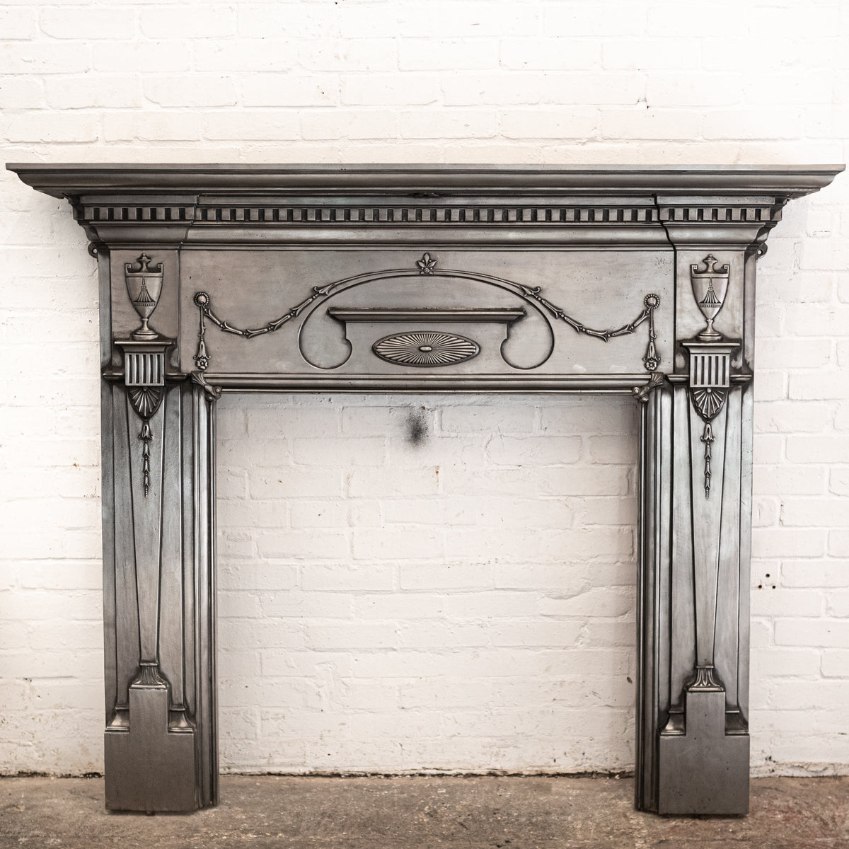 Antique Polished Cast Iron Fireplace Surround | The Architectural Forum