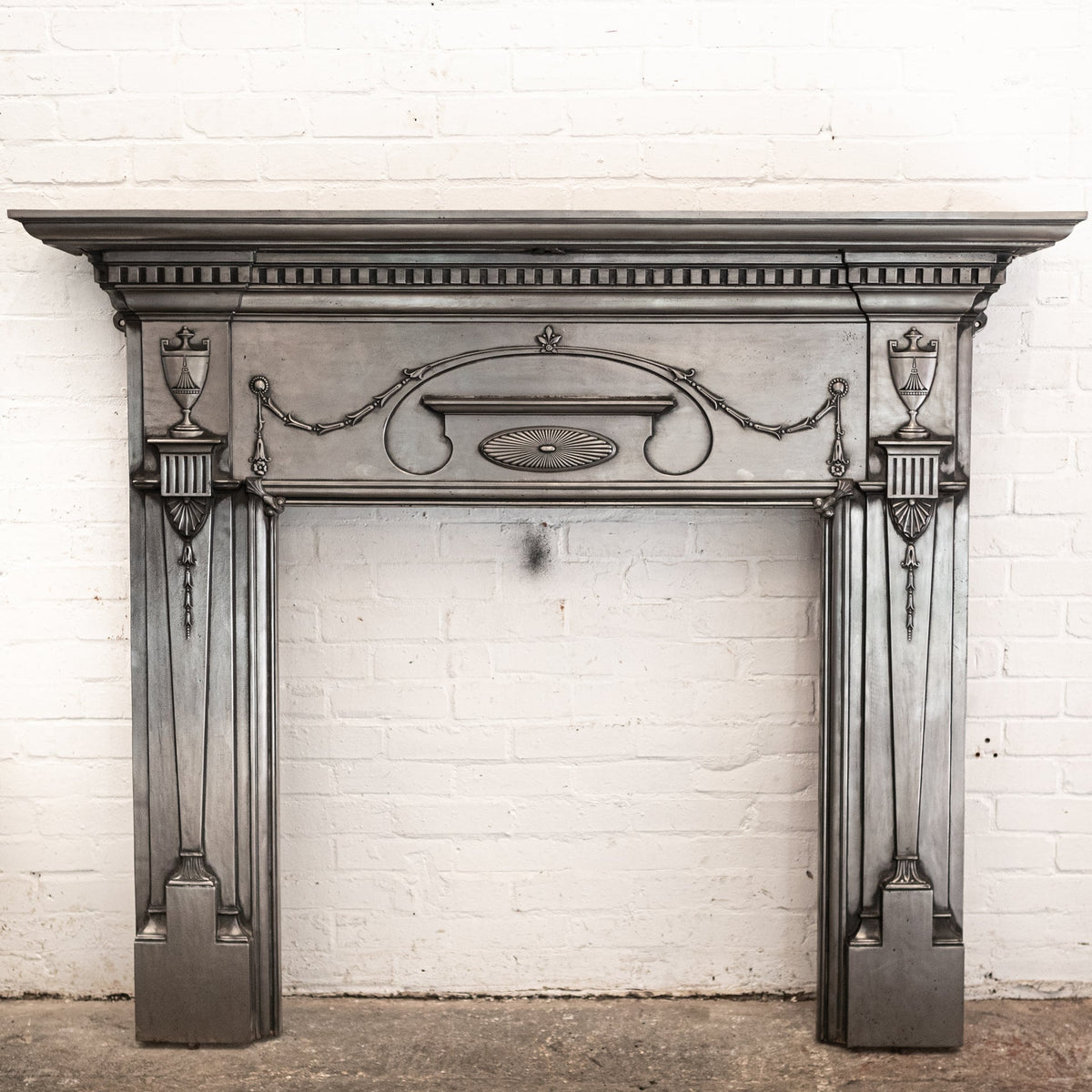 Antique Polished Cast Iron Fireplace Surround | The Architectural Forum