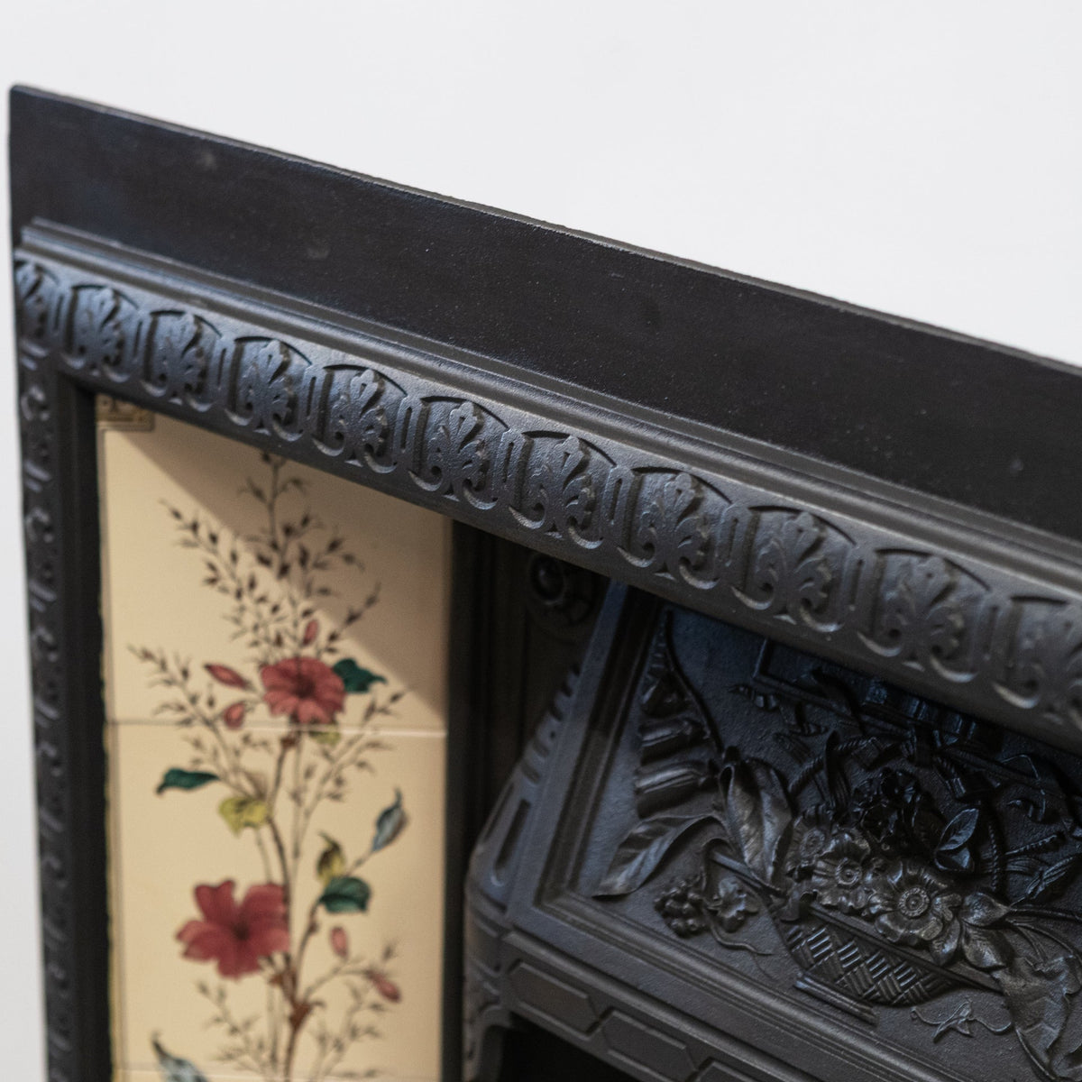 Antique Victorian Cast Iron Fireplace with Decorative Floral Tiles | The Architectural Forum