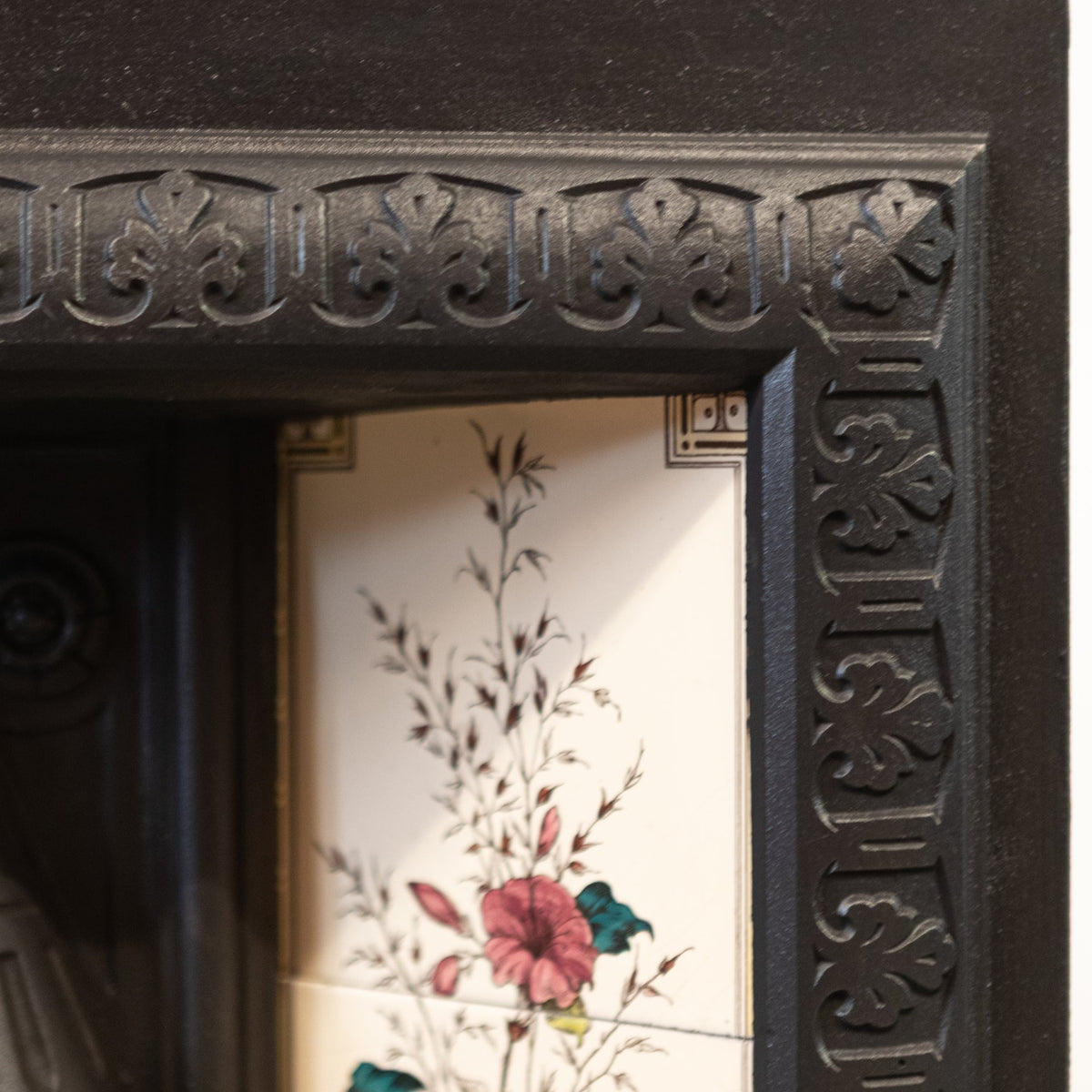 Antique Victorian Cast Iron Fireplace with Decorative Floral Tiles | The Architectural Forum