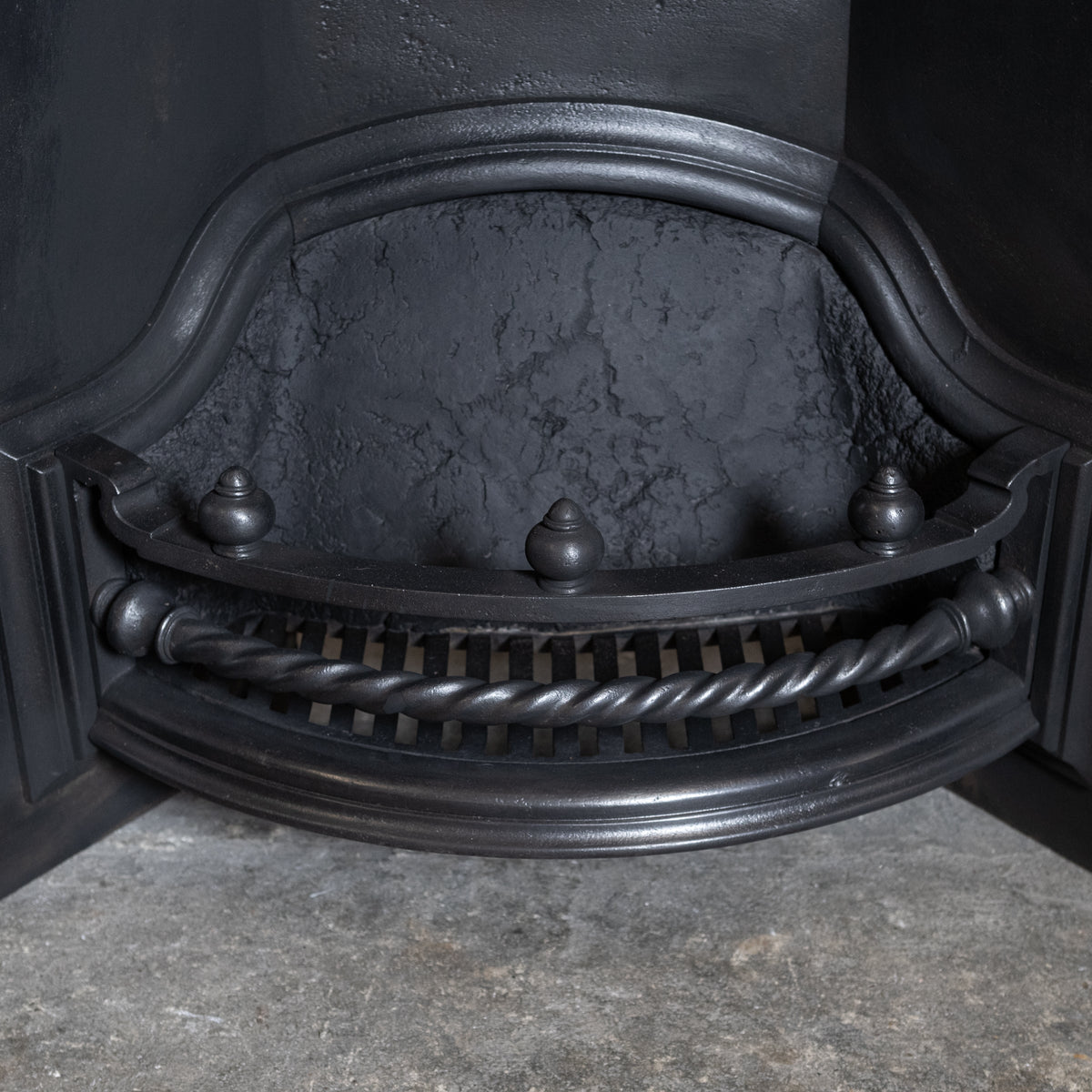 Antique Cast Iron Arched Fireplace Insert with Rope Detail | The Architectural Forum