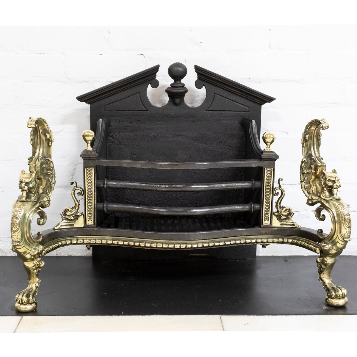 Antique Rococo Style Polished Steel and Brass Fire Basket with Griffins | The Architectural Forum