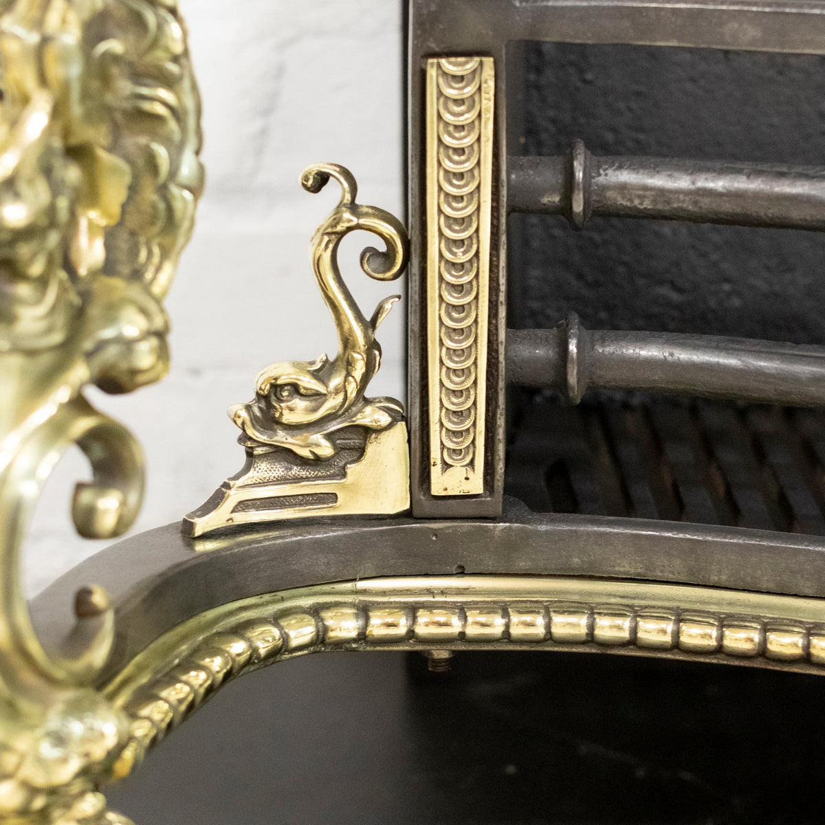 Antique Rococo Style Polished Steel and Brass Fire Basket with Griffins | The Architectural Forum