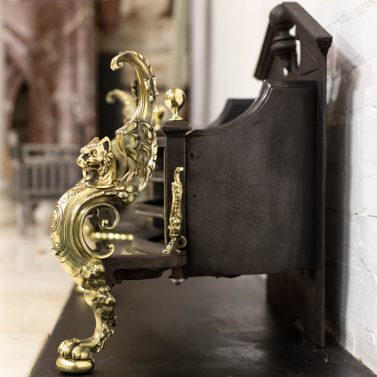 Antique Rococo Style Polished Steel and Brass Fire Basket with Griffins | The Architectural Forum