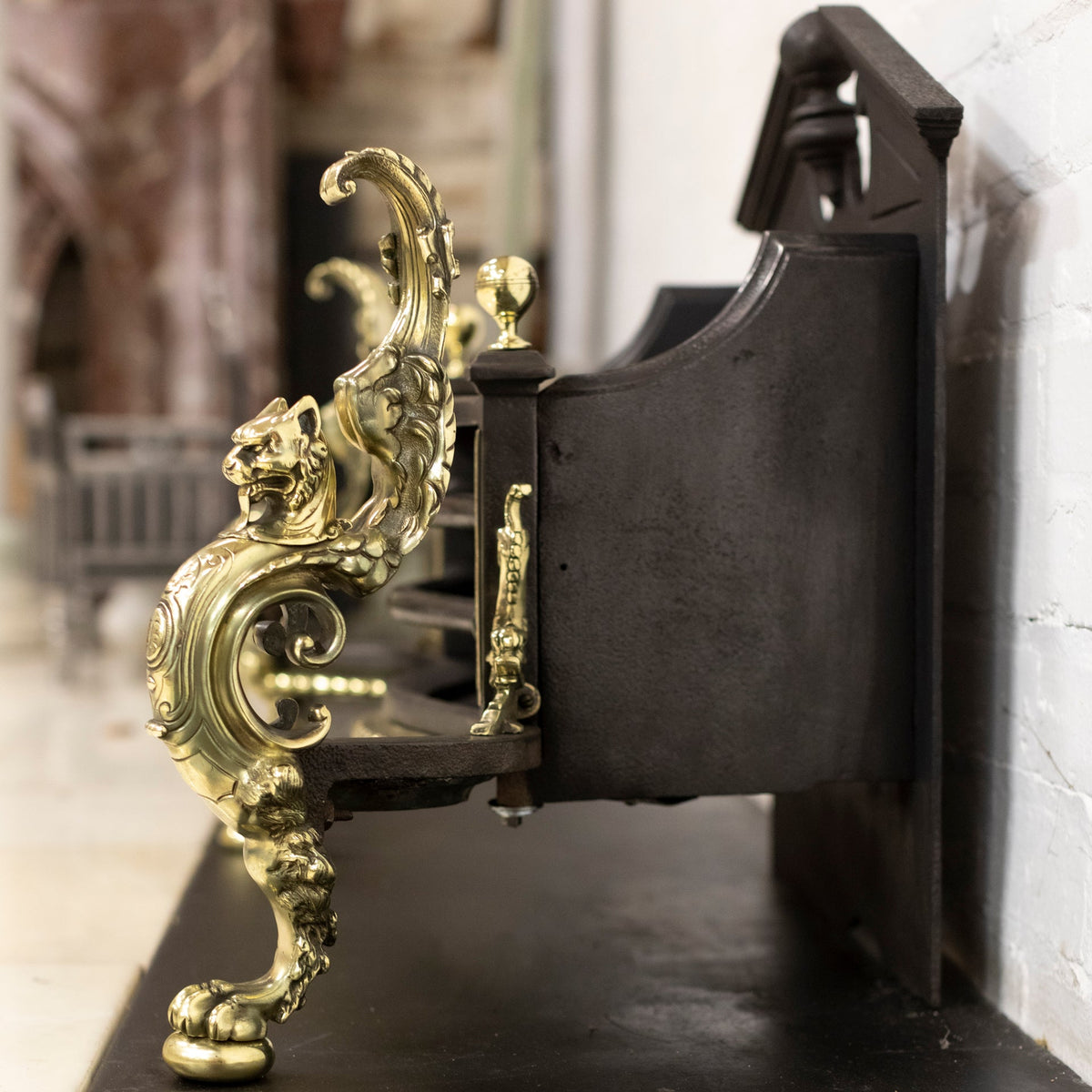 Antique Rococo Style Polished Steel and Brass Fire Basket with Griffins | The Architectural Forum
