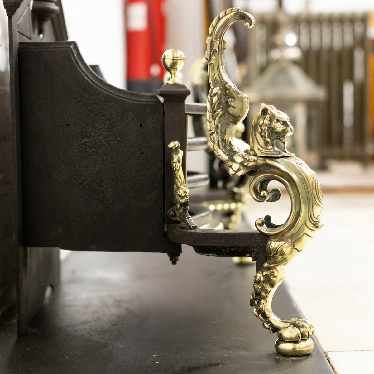 Antique Rococo Style Polished Steel and Brass Fire Basket with Griffins | The Architectural Forum