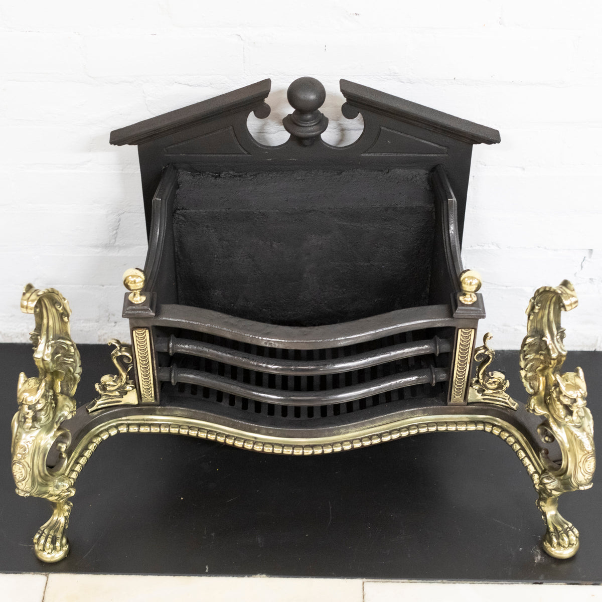 Antique Rococo Style Polished Steel and Brass Fire Basket with Griffins | The Architectural Forum