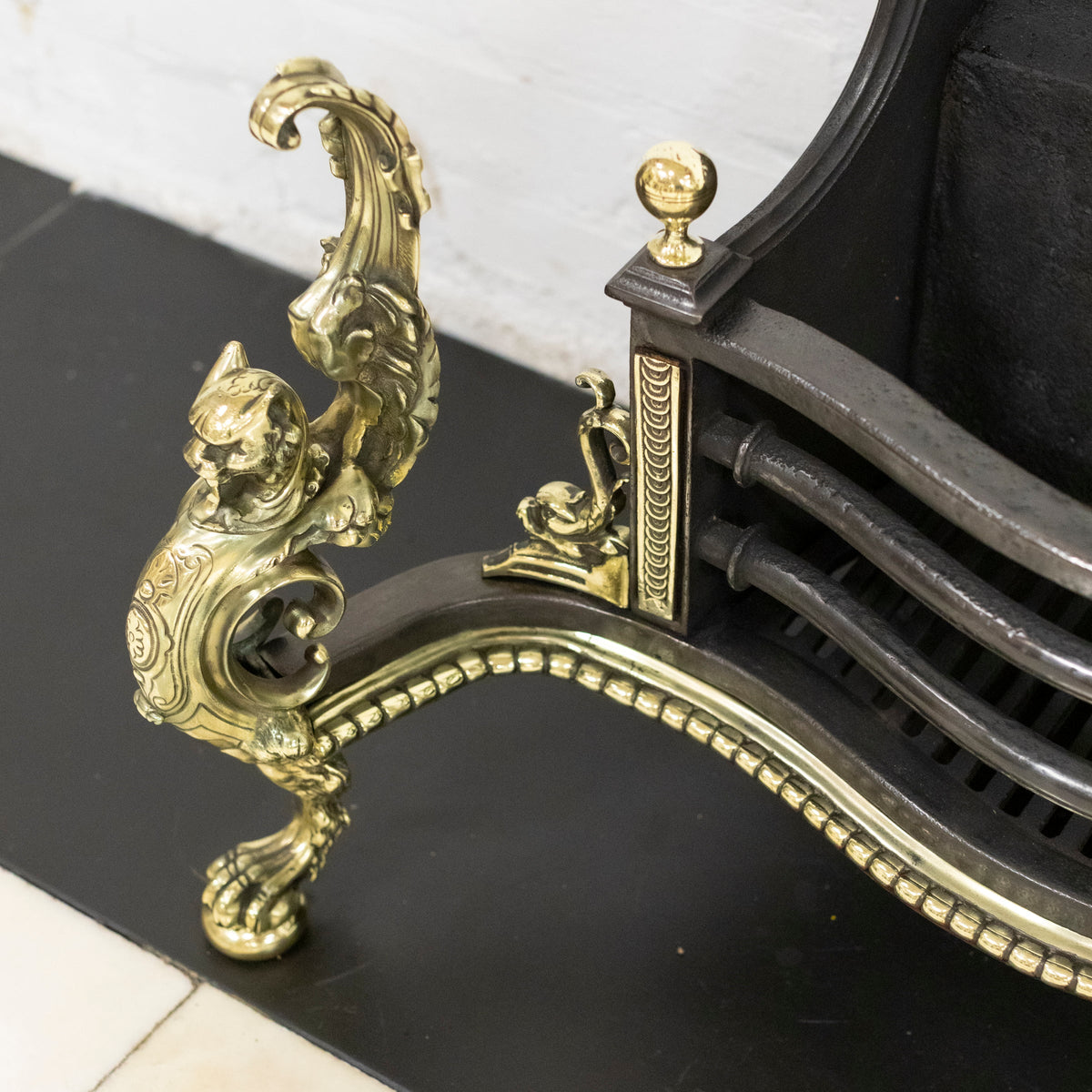 Antique Rococo Style Polished Steel and Brass Fire Basket with Griffins | The Architectural Forum