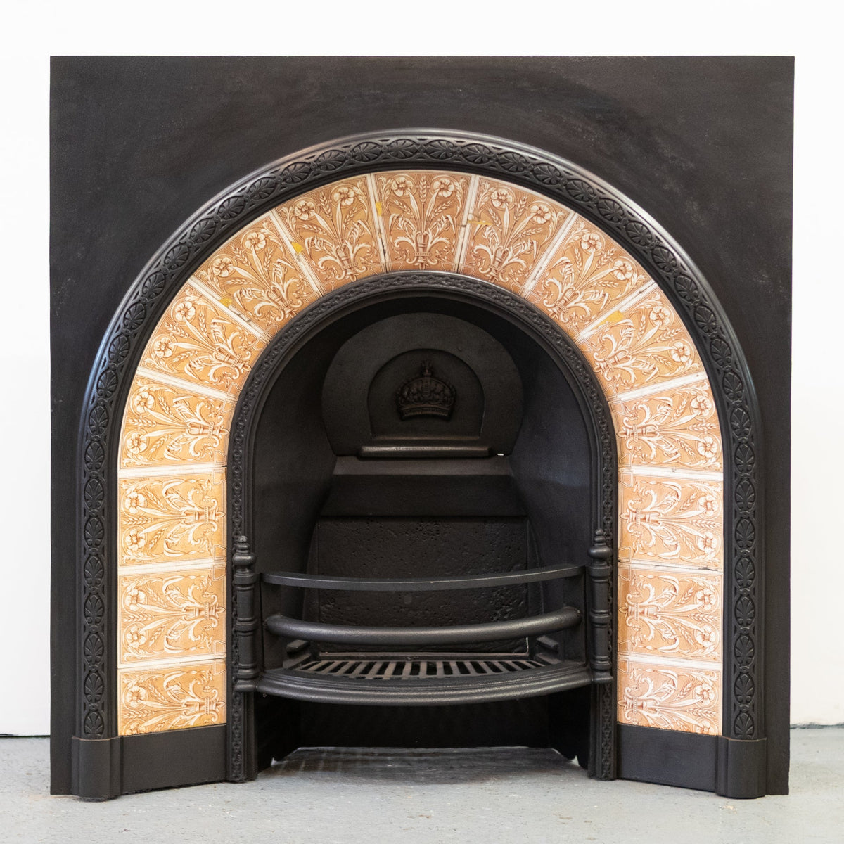 Antique Fireplace Insert with Tiled Arched Opening | Steele &amp; Wood Tiles | The Architectural Forum