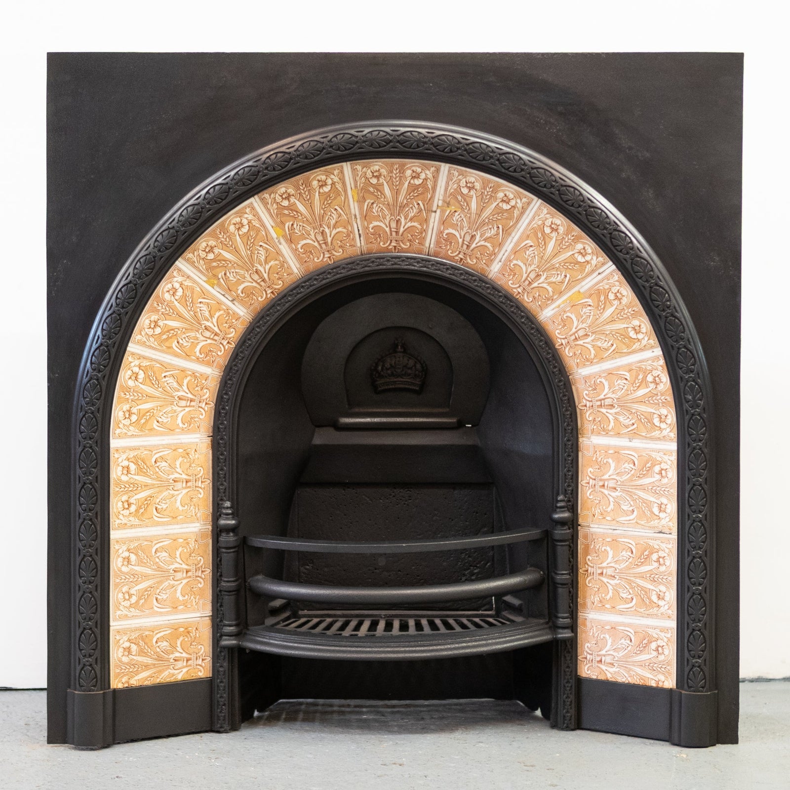 Antique Fireplace Insert with Tiled Arched Opening | Steele & Wood Tiles | The Architectural Forum