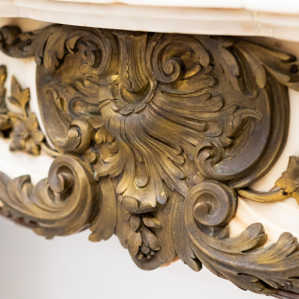 Antique French Louis XV Style Statuary Marble Fireplace with Brass Mounts | The Architectural Forum
