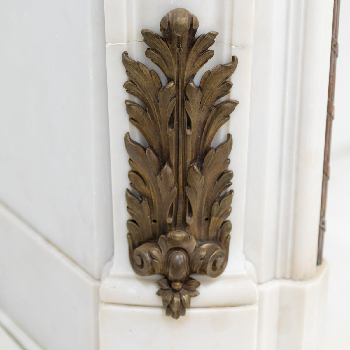 Antique French Louis XV Style Statuary Marble Fireplace with Brass Mounts | The Architectural Forum