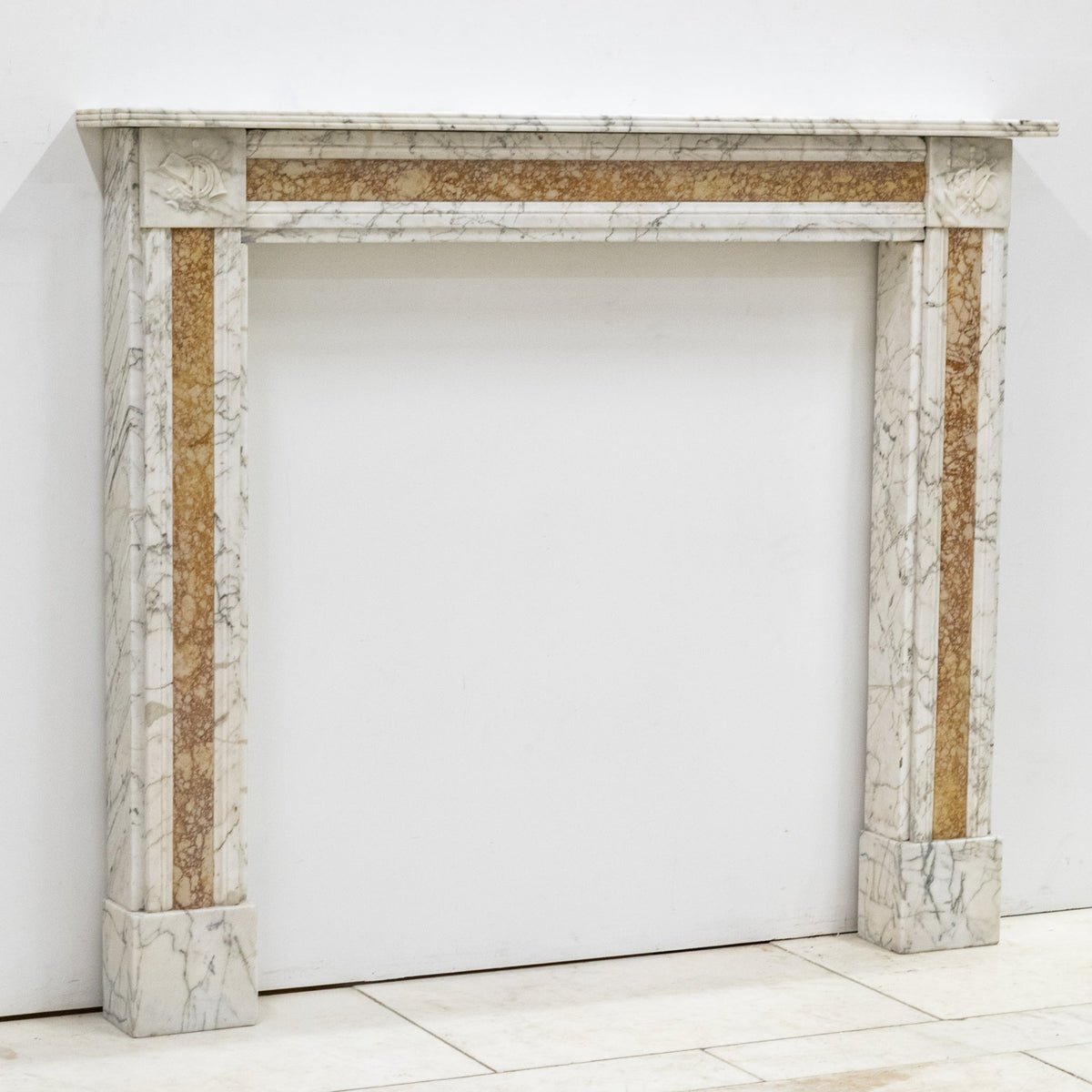 Regency Carrara Marble Fireplace Surround with Brocatelle Inlay | The Architectural Forum