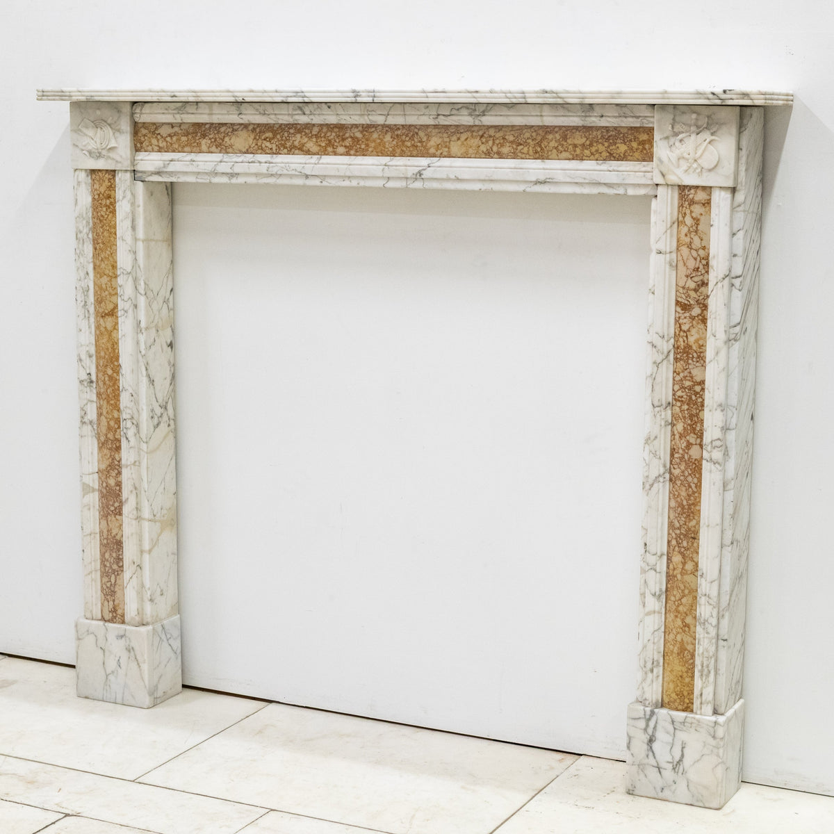 Regency Carrara Marble Fireplace Surround with Siena Inlay | The Architectural Forum