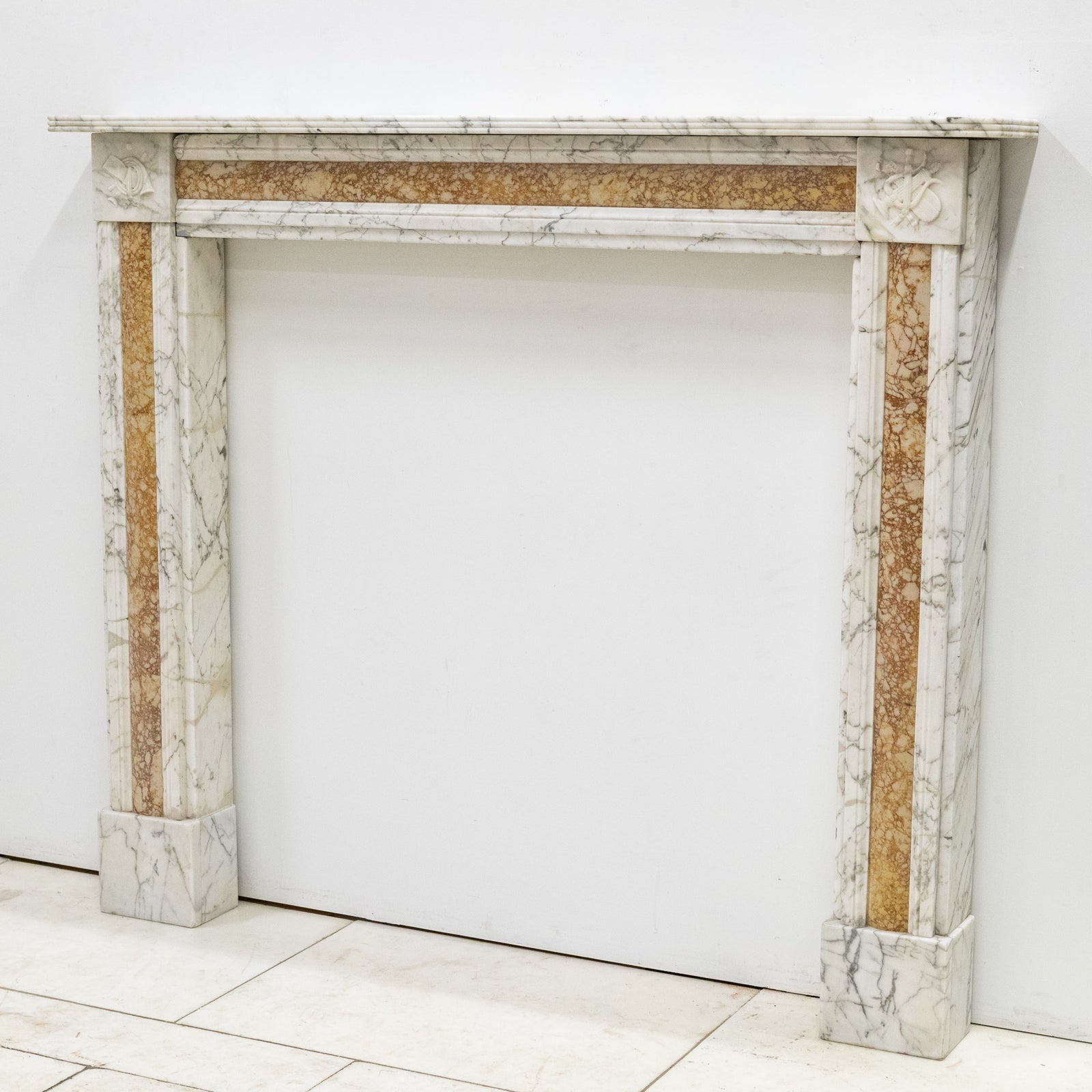 Regency Carrara Marble Fireplace Surround with Siena Inlay | The Architectural Forum