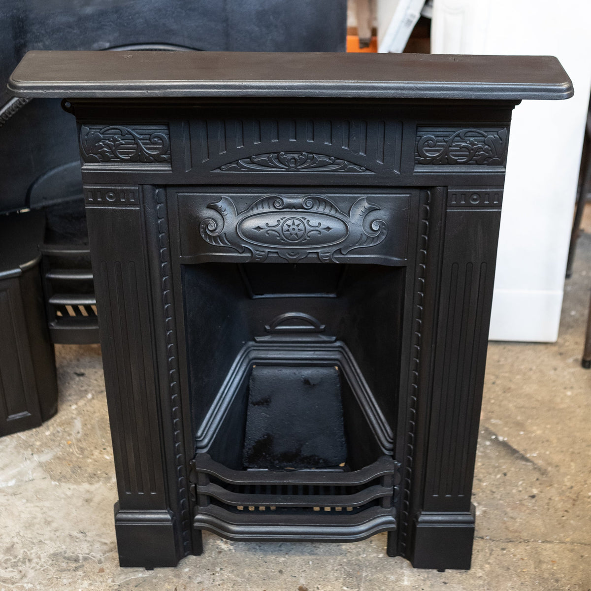 Antique Cast Iron Combination Fireplace | The Architectural Forum