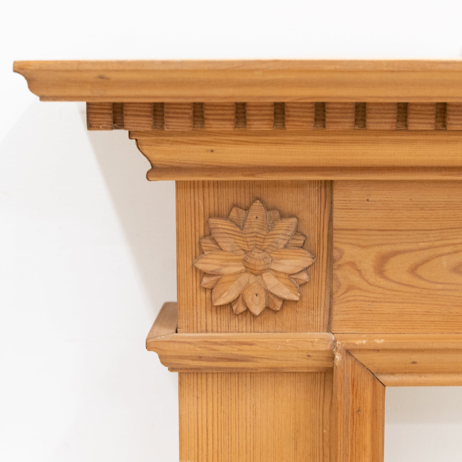 Antique Wooden Fireplace Surround with Flowers | The Architectural Forum