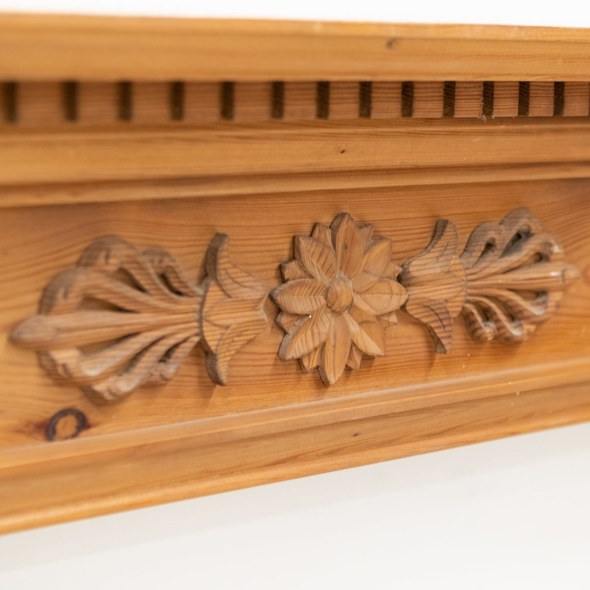 Antique Wooden Fireplace Surround with Flowers | The Architectural Forum