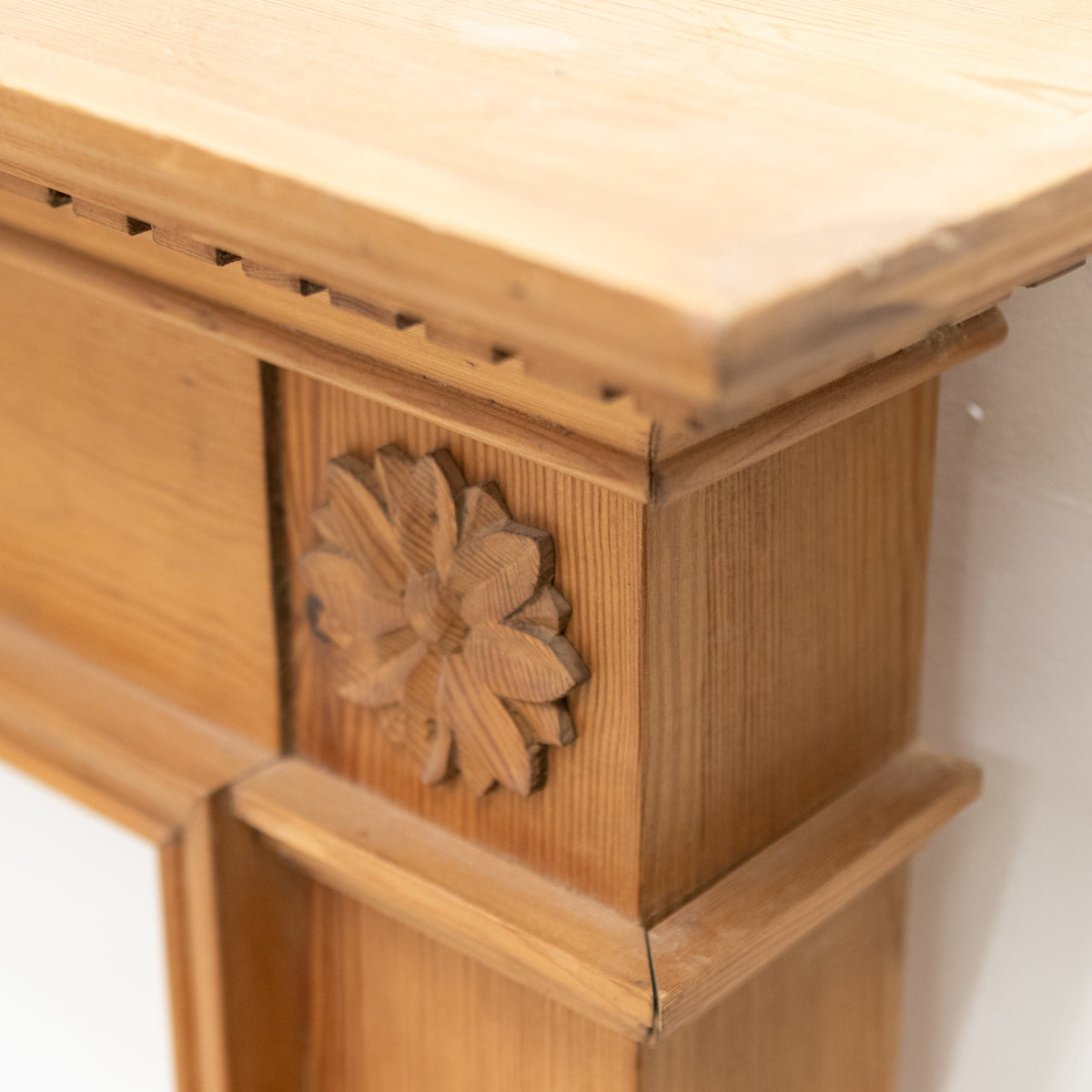 Antique Wooden Fireplace Surround with Flowers | The Architectural Forum
