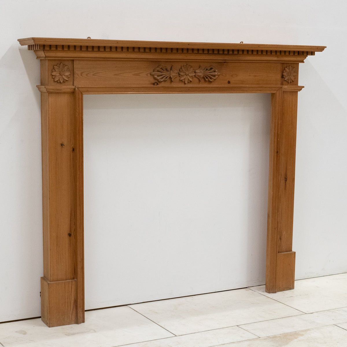 Antique Wooden Fireplace Surround with Flowers | The Architectural Forum