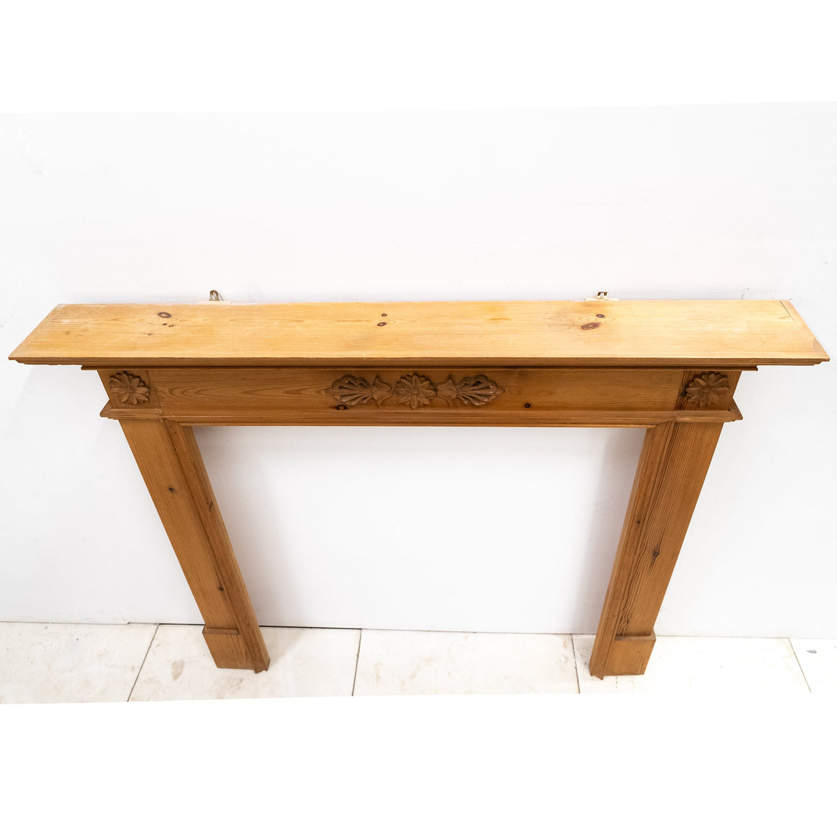 Antique Wooden Fireplace Surround with Flowers | The Architectural Forum