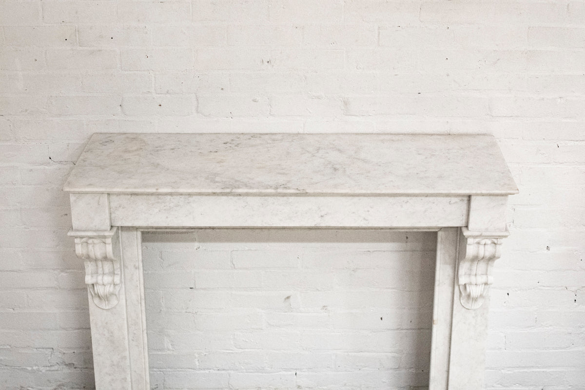 Antique 19th Century French Style Carved Marble Fireplace in Carrara Marble | The Architectural Forum
