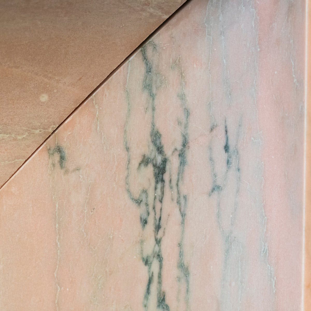 Bolection Fireplace Surround in Reclaimed Pink Marble | The Architectural Forum