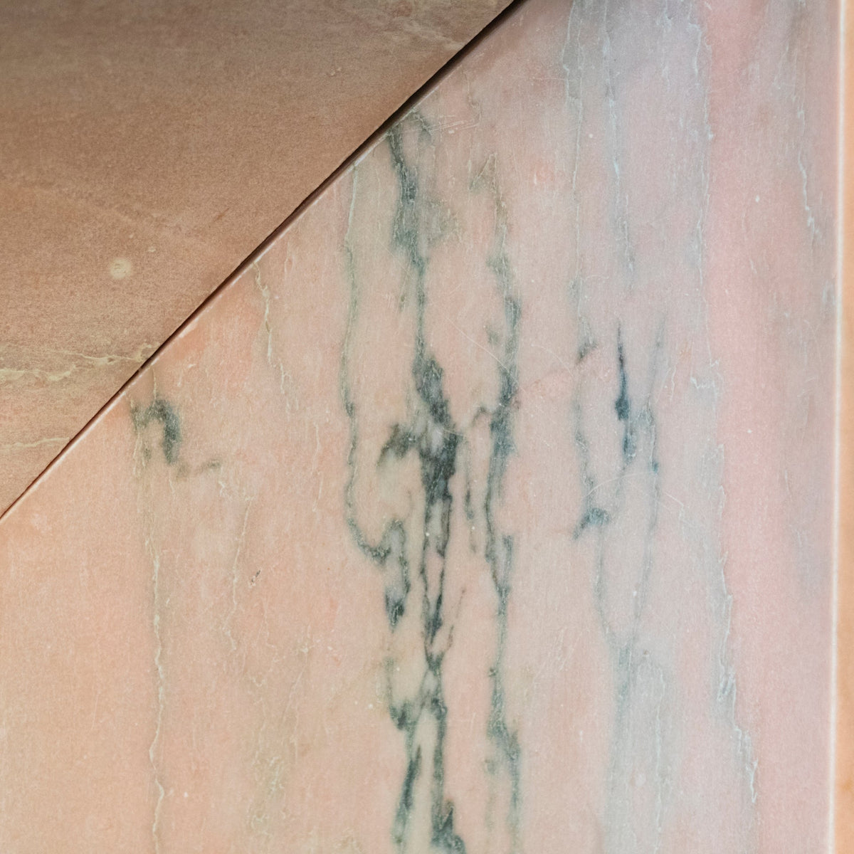 Bolection Fireplace Surround in Reclaimed Pink Marble | The Architectural Forum