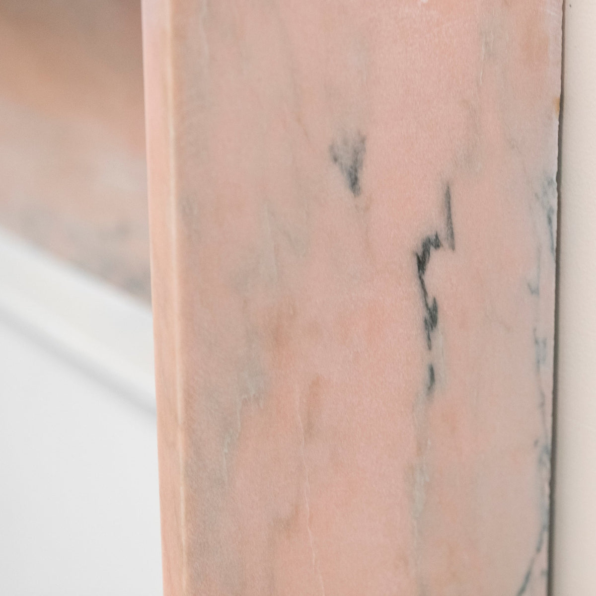 Bolection Fireplace Surround in Reclaimed Pink Marble | The Architectural Forum