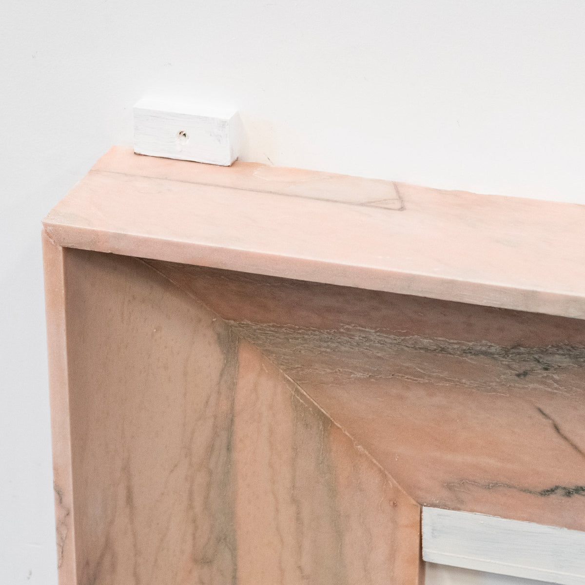 Bolection Fireplace Surround in Reclaimed Pink Marble | The Architectural Forum