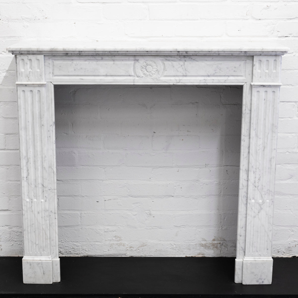 Reclaimed Louis XVI Style Carved Marble Fireplace in Carrara Marble | The Architectural Forum