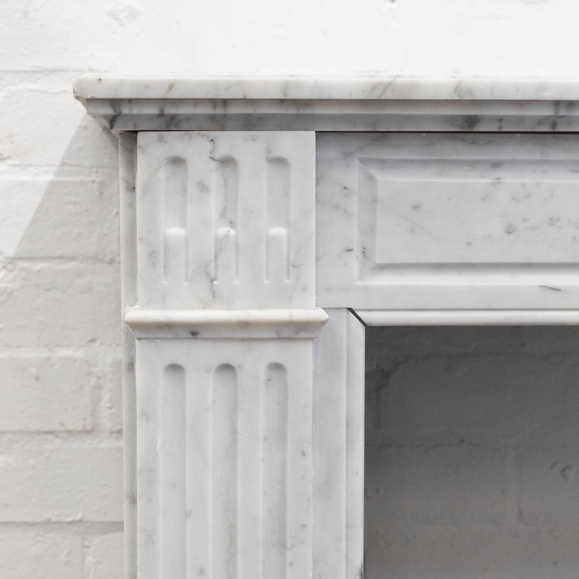 Reclaimed Louis XVI Style Carved Marble Fireplace in Carrara Marble | The Architectural Forum