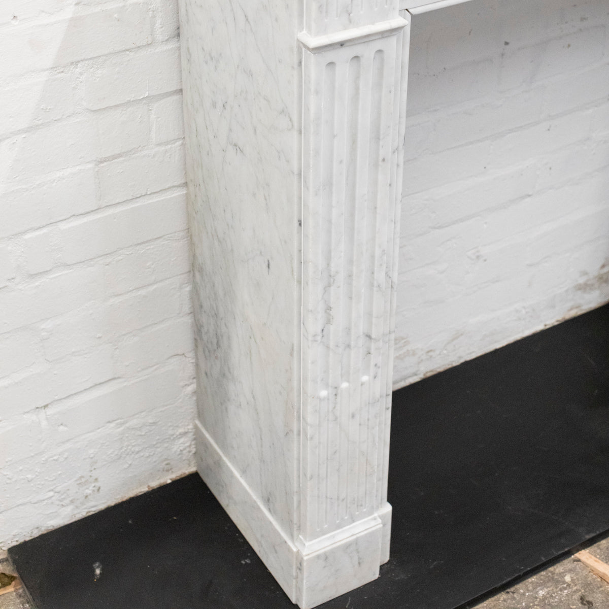 Reclaimed Louis XVI Style Carved Marble Fireplace in Carrara Marble | The Architectural Forum